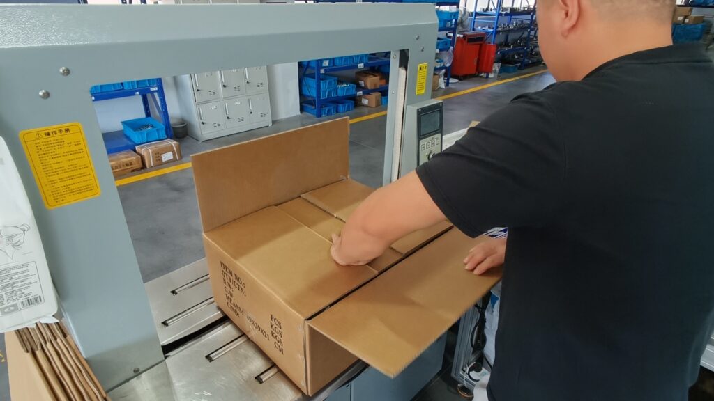 Strapped cartons prepared for shipment